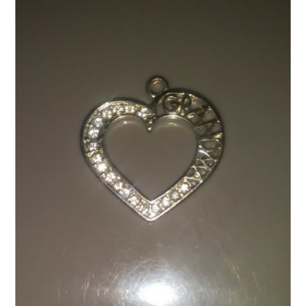Silver heart pendant with Grandma on it